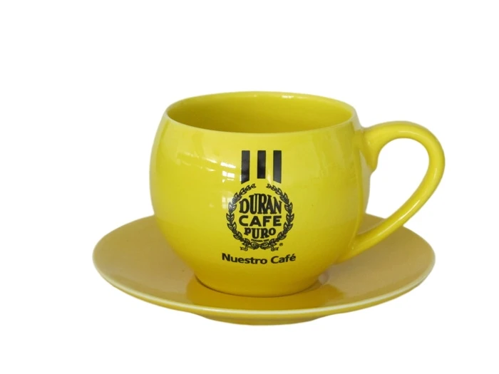 yellow ceramic coffee cup and saucer yellow ceramic coffee cup and saucer