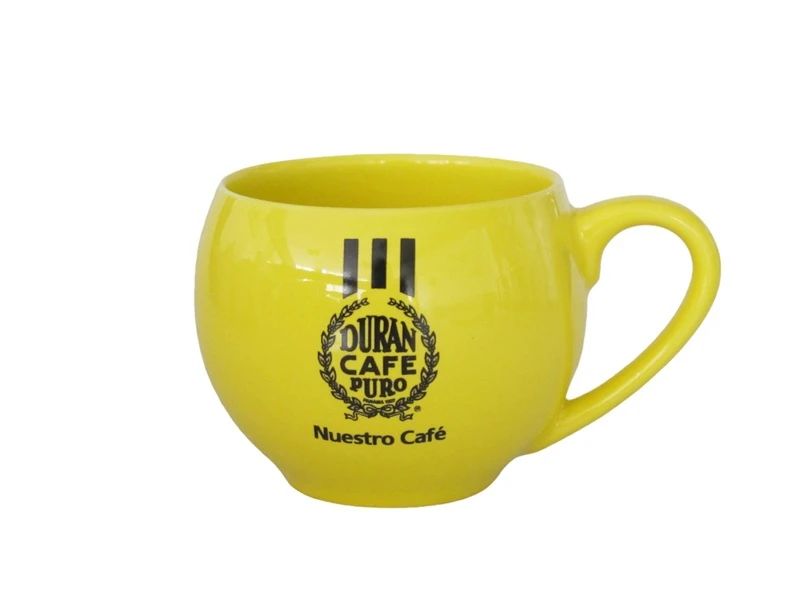 yellow ceramic coffee cup and saucer 1 yellow ceramic coffee cup and saucer 1